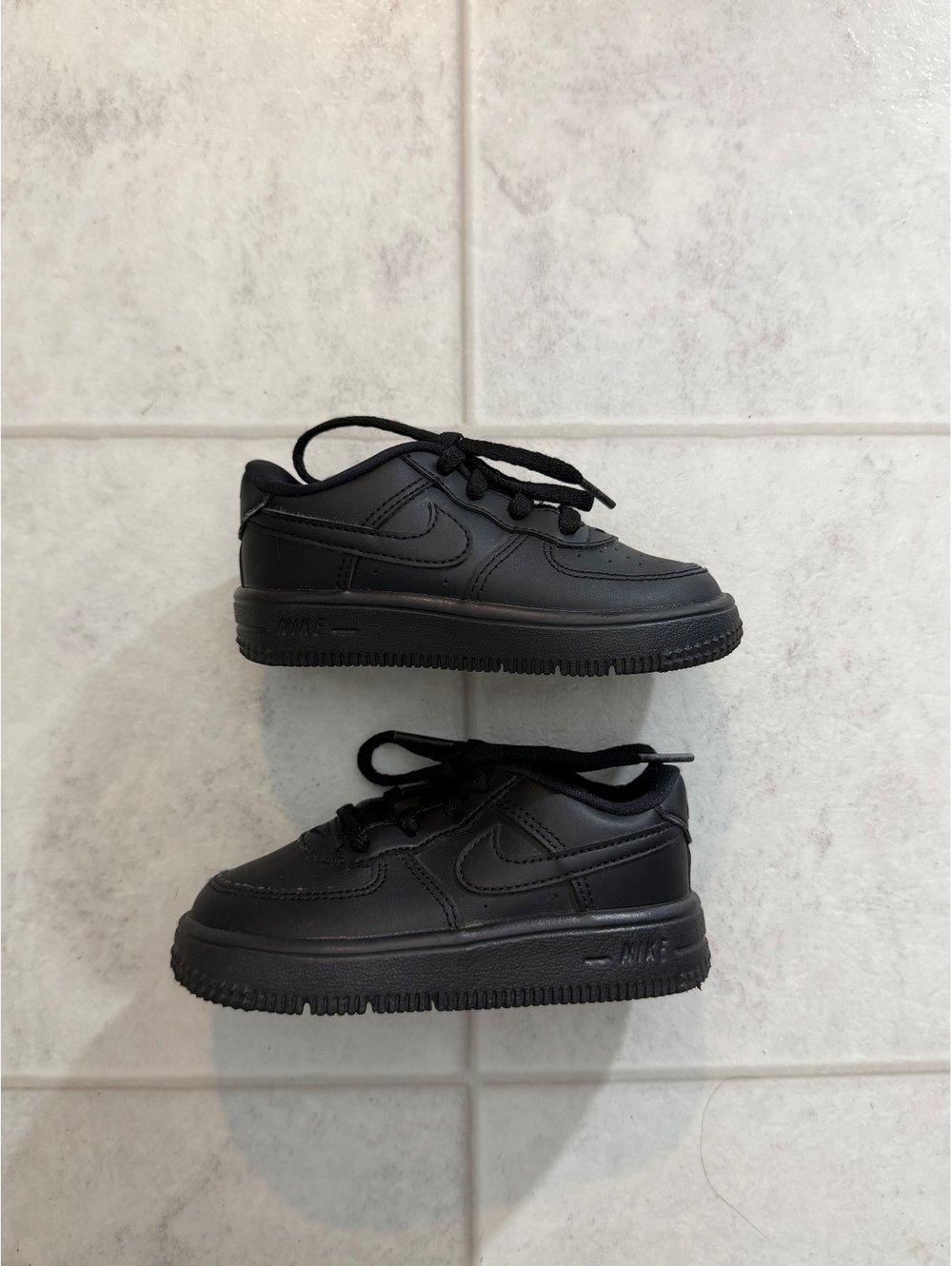 Nike Air Force 1 black low top sneakers
